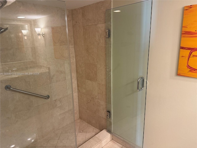 bathroom featuring an enclosed shower