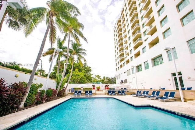 view of pool featuring a patio