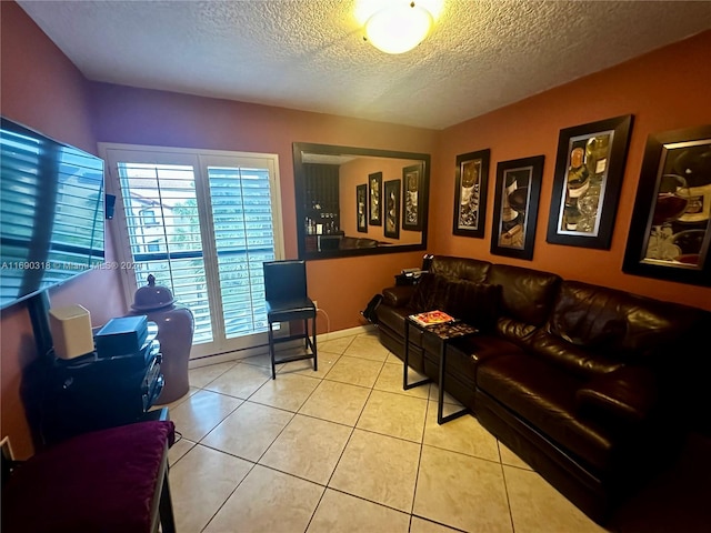 tiled living room with a textured ceiling