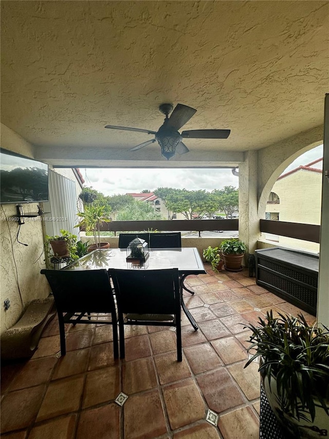 view of patio with ceiling fan