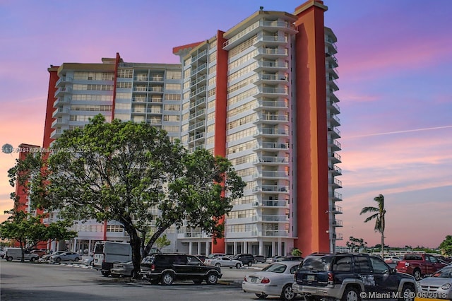 view of outdoor building at dusk