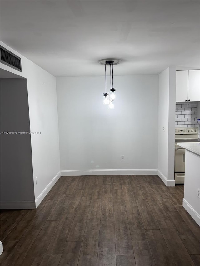 interior space with dark hardwood / wood-style floors