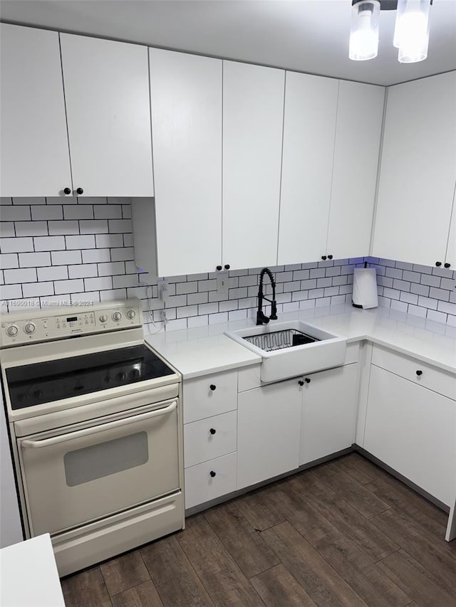 kitchen featuring white cabinetry, sink, dark hardwood / wood-style floors, white electric stove, and decorative backsplash