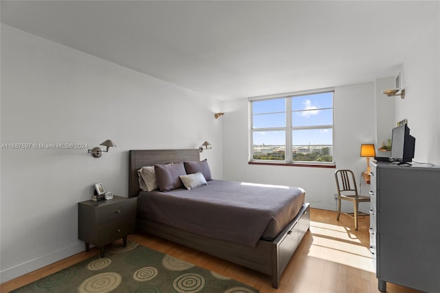 bedroom with light hardwood / wood-style floors