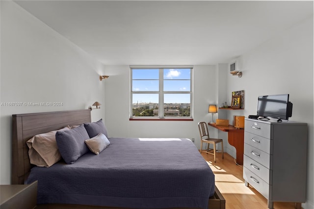 bedroom featuring light hardwood / wood-style floors