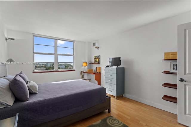 bedroom with light hardwood / wood-style floors