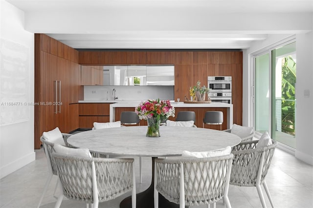 dining space with sink