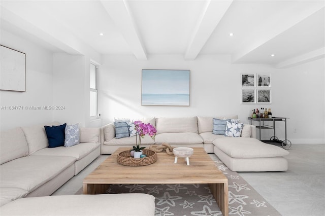 living room with beamed ceiling