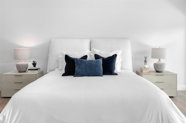 bedroom featuring light wood-type flooring