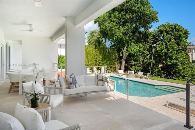 view of pool featuring a patio and ceiling fan