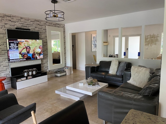 living room with a notable chandelier