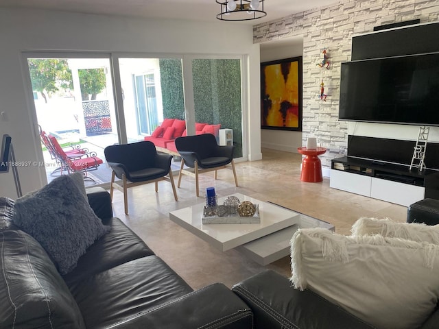 living room with a notable chandelier