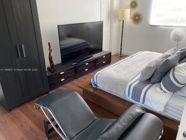 bedroom featuring dark hardwood / wood-style floors