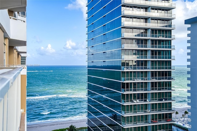 view of water feature with a beach view