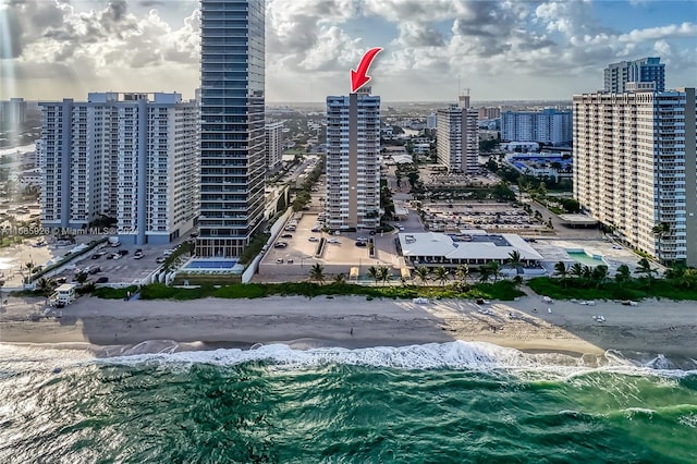 property's view of city with a beach view and a water view