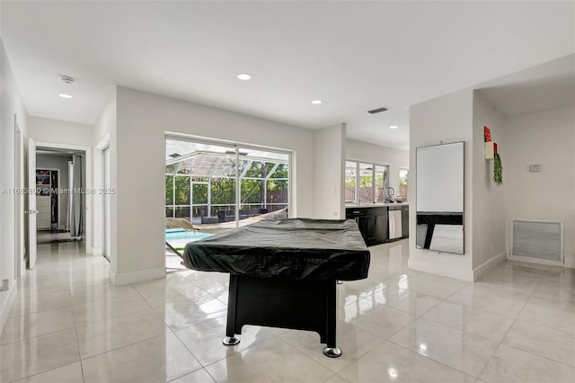 rec room with a swimming pool, light tile patterned flooring, and billiards