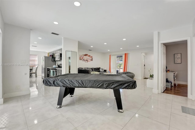 rec room featuring light tile patterned flooring and billiards