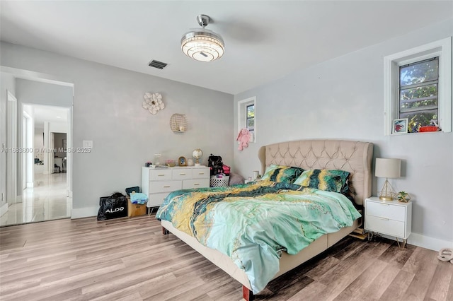 bedroom featuring light hardwood / wood-style flooring