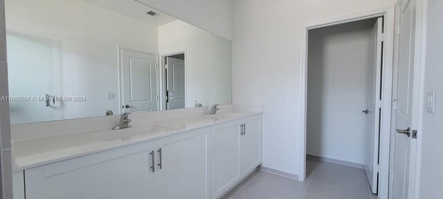 bathroom featuring vanity and tile patterned floors