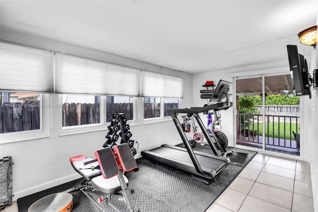 workout area with light tile patterned floors