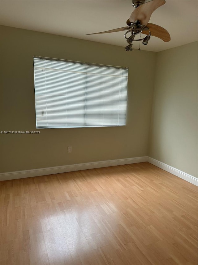 unfurnished room with light hardwood / wood-style floors and ceiling fan