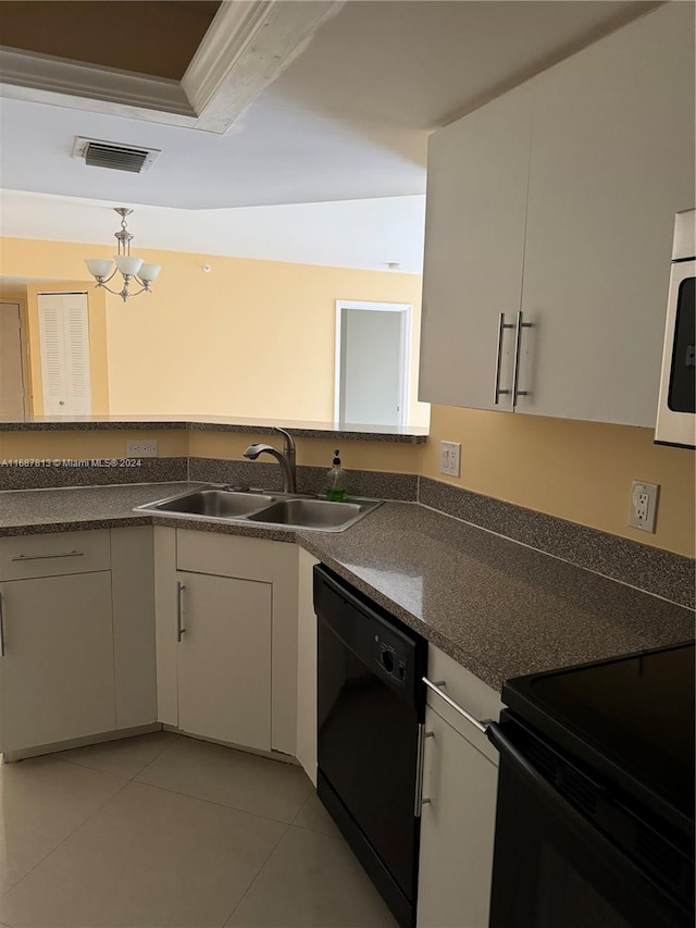 kitchen featuring black appliances, sink, light tile patterned flooring, white cabinetry, and decorative light fixtures