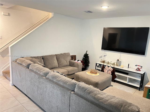 living room featuring light tile patterned flooring