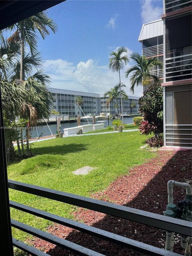 view of yard featuring a balcony