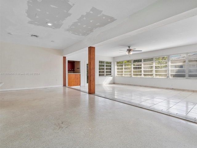 spare room with ceiling fan