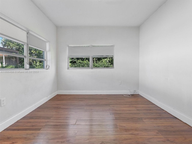 empty room featuring dark hardwood / wood-style floors