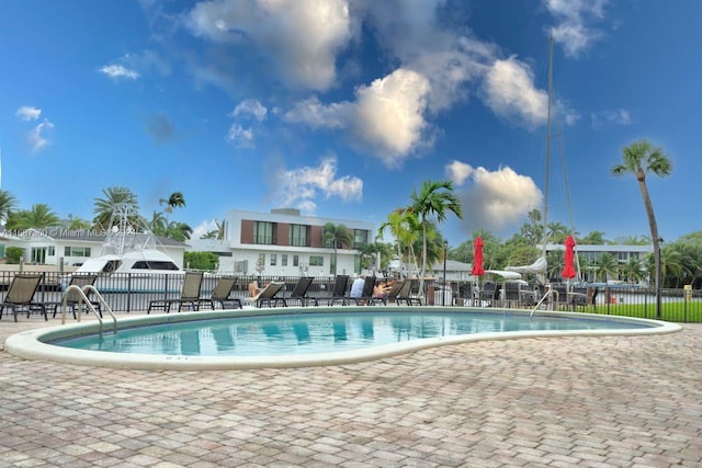 view of swimming pool with a patio area