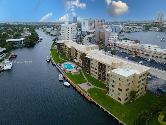 birds eye view of property featuring a water view