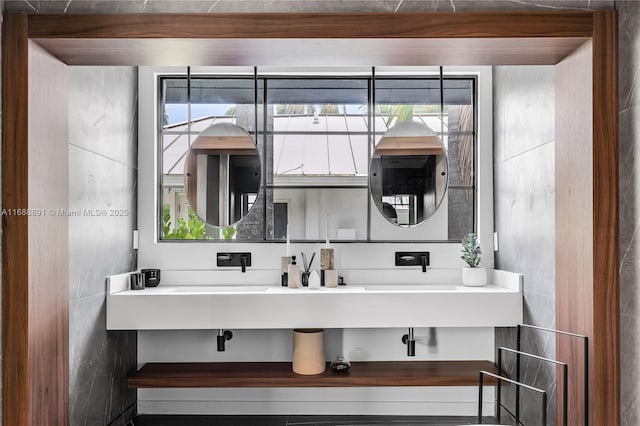 bathroom featuring plenty of natural light and vanity