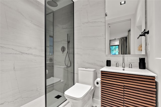 full bath with toilet, vanity, tile walls, backsplash, and a marble finish shower