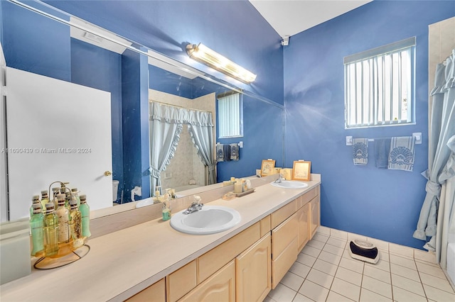 bathroom with vanity, tile patterned floors, and a shower with curtain