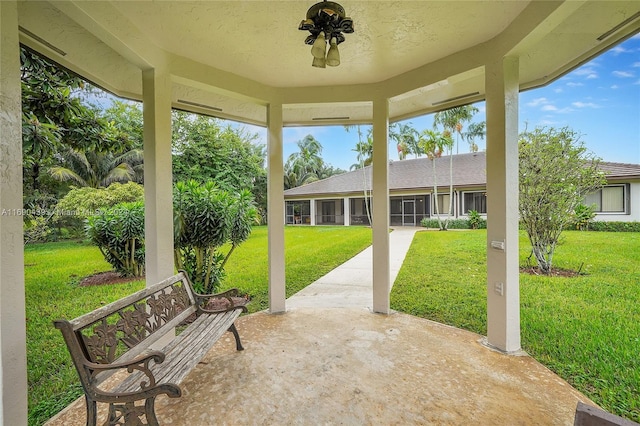 view of patio featuring ceiling fan