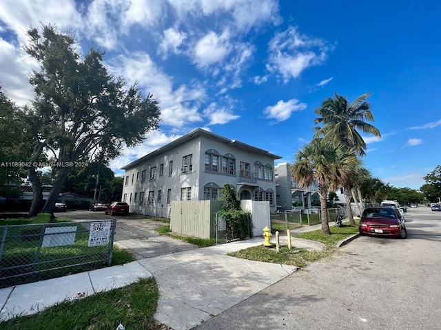 view of property exterior with a balcony