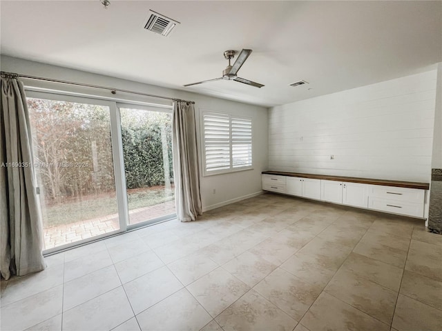 empty room with ceiling fan