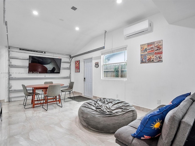 living room with vaulted ceiling and a wall mounted AC