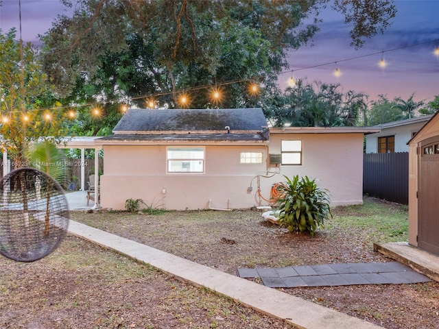 view of property exterior at dusk