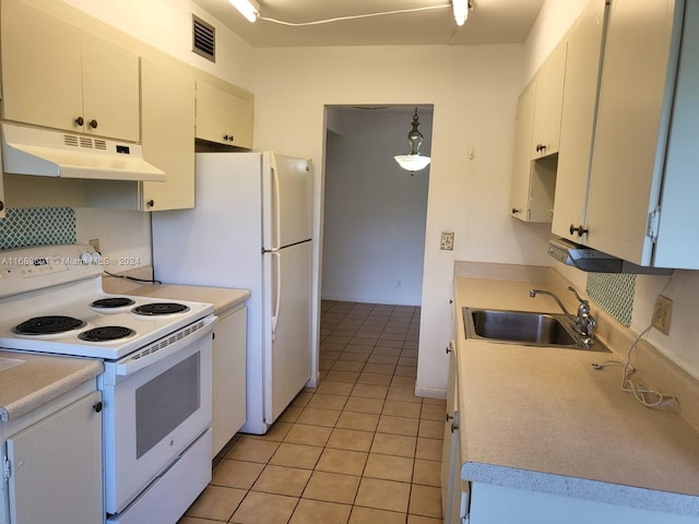 kitchen featuring white cabinets, hanging light fixtures, sink, light tile patterned floors, and white appliances