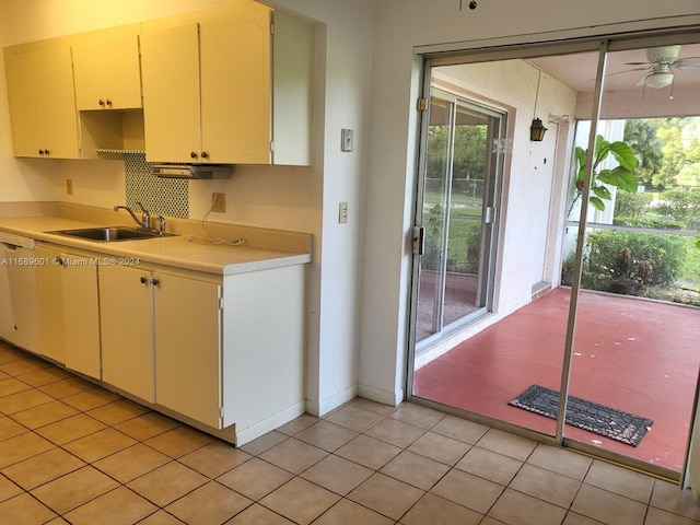 8000 Lagos De Campo Blvd Unit A-106, Tamarac, FL 33321 - kitchen featuring light countertops, a sink, a ceiling fan, dishwasher, and baseboards