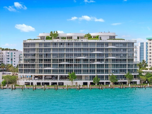 1135 103rd St Unit 403, Bay Harbor Islands, FL 33154 - view of building exterior featuring a water view