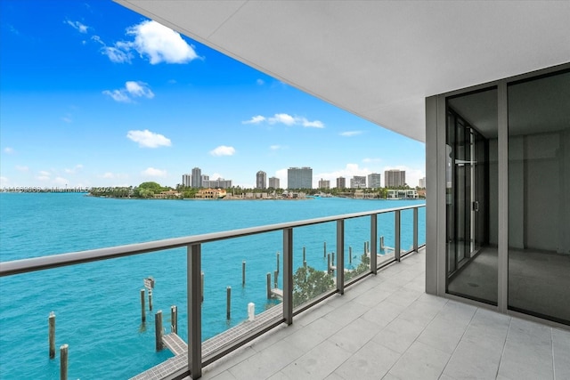 1135 103rd St Unit 403, Bay Harbor Islands, FL 33154 - balcony with a water view and a view of skyline