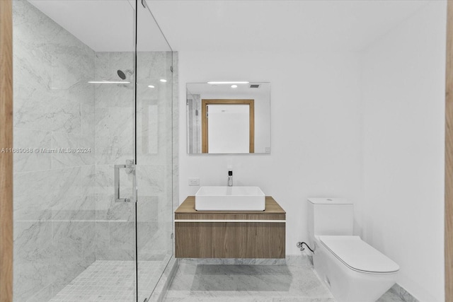 bathroom featuring vanity, toilet, and an enclosed shower