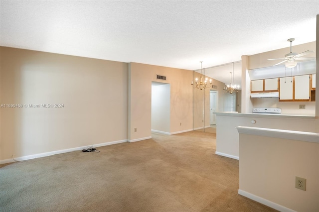 interior space featuring light colored carpet, ceiling fan with notable chandelier, a textured ceiling, and lofted ceiling