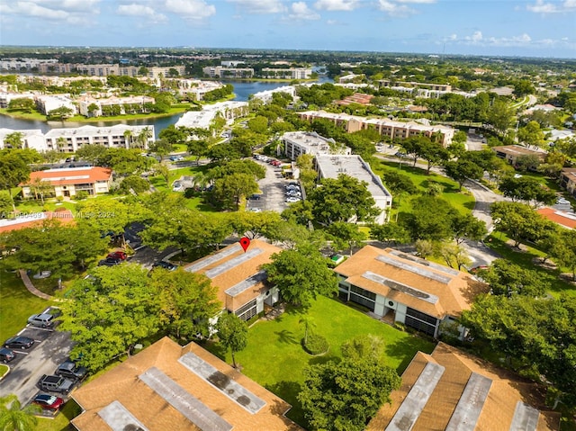 bird's eye view with a water view