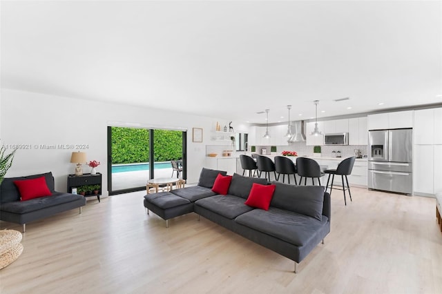 living room featuring light wood-type flooring