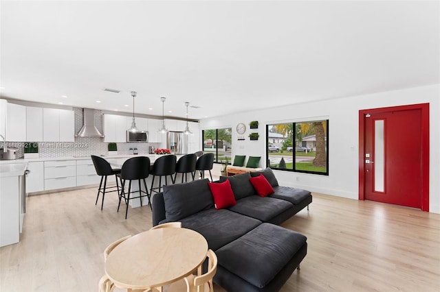 living room featuring light wood-type flooring