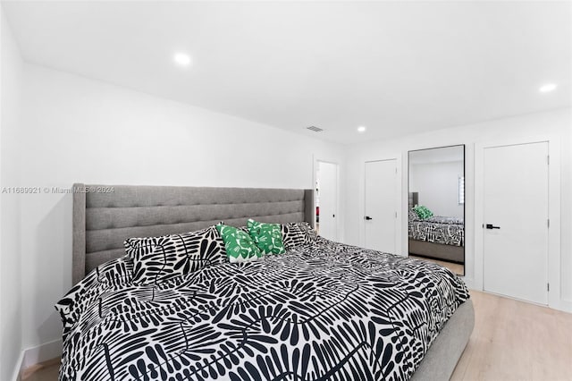 bedroom featuring light wood-type flooring